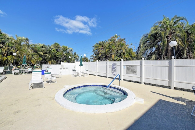 1320 NW 20th Ave Unit 202, Delray Beach, FL 33445 - view of pool featuring a hot tub
