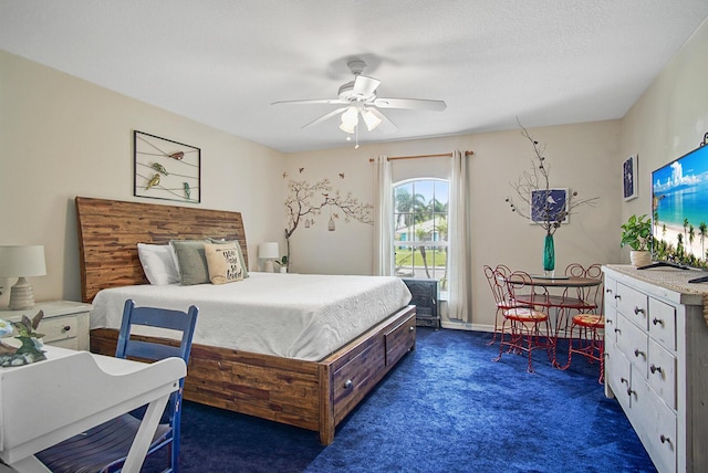 3283 SE W Snow Rd, Port Saint Lucie, FL 34984 - bedroom featuring dark carpet and a ceiling fan