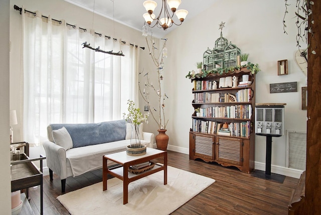 3283 SE W Snow Rd, Port Saint Lucie, FL 34984 - living area featuring wood finished floors and a chandelier