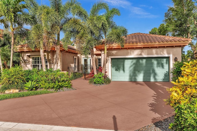 20677 NW 26th Ct, Boca Raton, FL 33434 - mediterranean / spanish house with stucco siding, a tile roof, an attached garage, and driveway