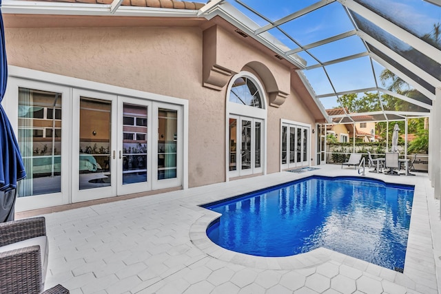 20677 NW 26th Ct, Boca Raton, FL 33434 - outdoor pool featuring french doors, a patio, and glass enclosure
