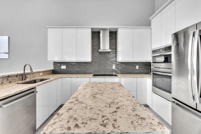 20677 NW 26th Ct, Boca Raton, FL 33434 - kitchen with appliances with stainless steel finishes, a sink, modern cabinets, wall chimney range hood, and white cabinets
