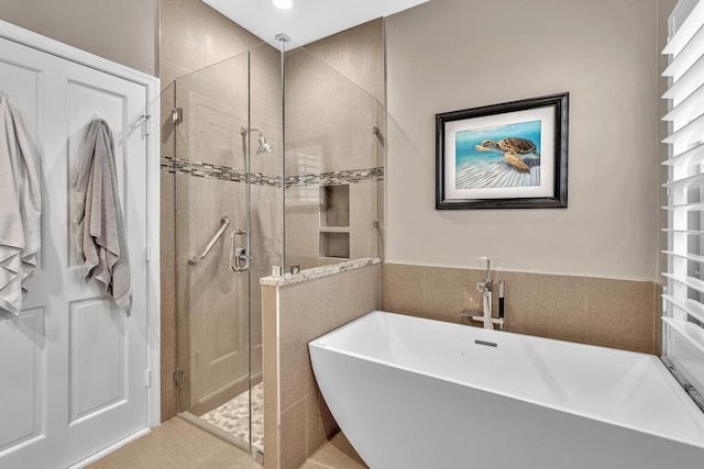 20677 NW 26th Ct, Boca Raton, FL 33434 - bathroom featuring a freestanding tub and a stall shower