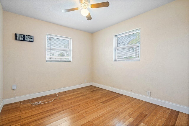 1209 N Australian Ave, West Palm Beach, FL 33401 - spare room with light wood-style floors and ceiling fan