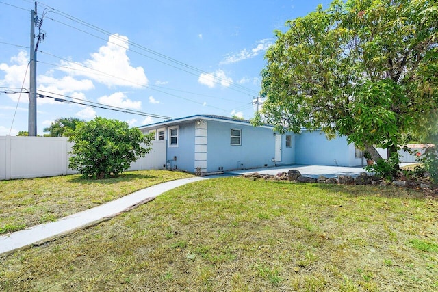 1209 N Australian Ave, West Palm Beach, FL 33401 - back of house with a patio area