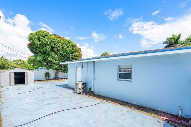 1209 N Australian Ave, West Palm Beach, FL 33401 - view of patio with a shed