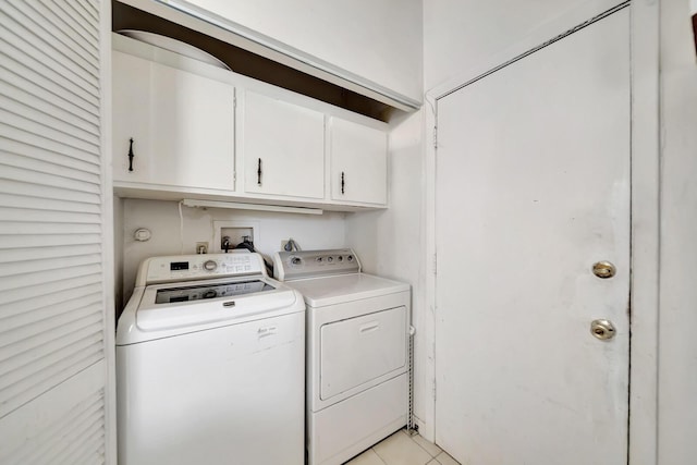10151 Windtree Ln N, Boca Raton, FL 33428 - washroom featuring cabinet space and washing machine and dryer