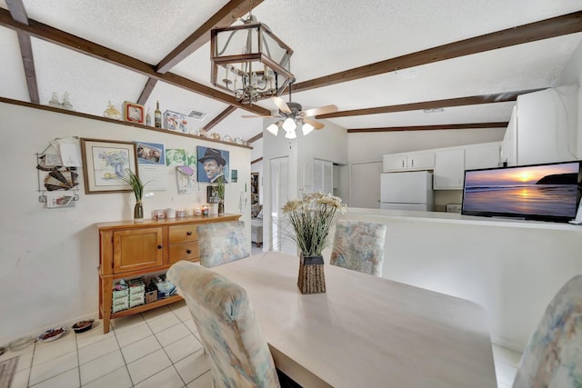 10151 Windtree Ln N, Boca Raton, FL 33428 - dining space featuring light tile patterned floors, ceiling fan, and a textured ceiling