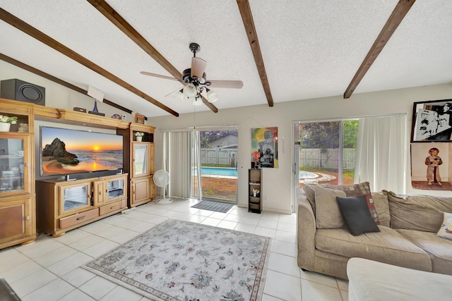 10151 Windtree Ln N, Boca Raton, FL 33428 - living room featuring a textured ceiling, a ceiling fan, and light tile patterned floors