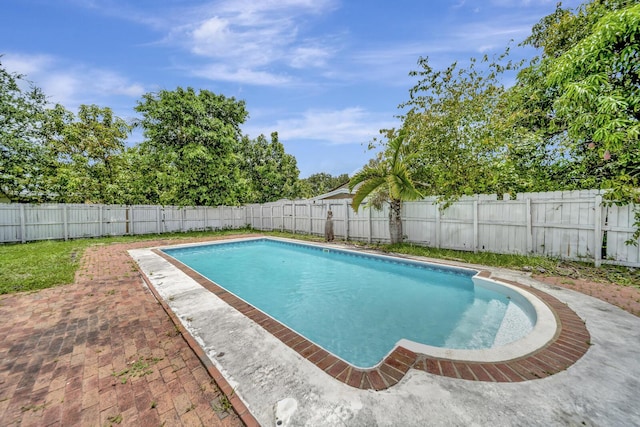 10151 Windtree Ln N, Boca Raton, FL 33428 - view of swimming pool with a fenced backyard and a patio area