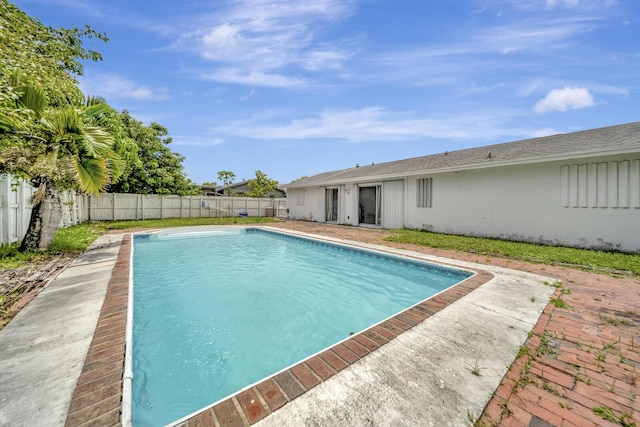 10151 Windtree Ln N, Boca Raton, FL 33428 - view of swimming pool with a fenced backyard and a patio