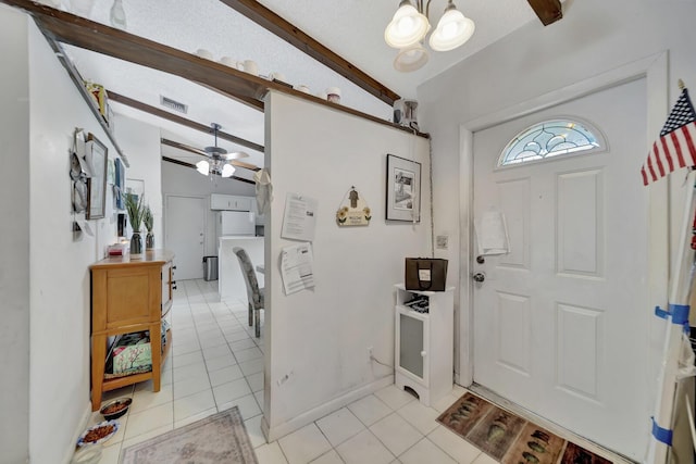 10151 Windtree Ln N, Boca Raton, FL 33428 - entrance foyer featuring light tile patterned floors, a ceiling fan, and a chandelier