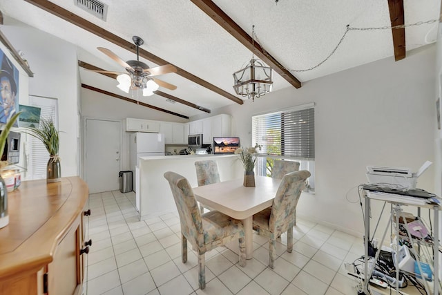10151 Windtree Ln N, Boca Raton, FL 33428 - dining room featuring a textured ceiling, ceiling fan, a chandelier, and light tile patterned floors