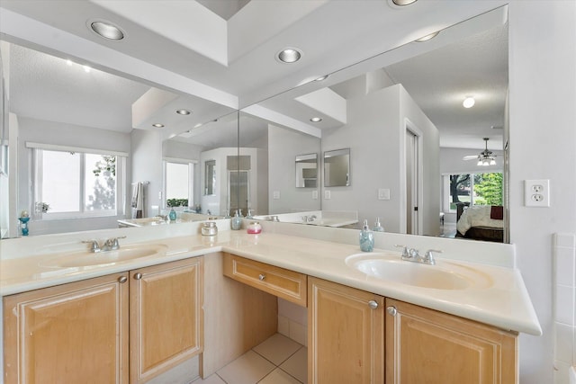 8073 Pelican Harbour Dr, Lake Worth, FL 33467 - ensuite bathroom with double vanity, tile patterned flooring, recessed lighting, and ceiling fan