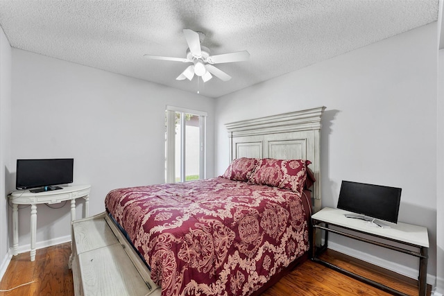 8073 Pelican Harbour Dr, Lake Worth, FL 33467 - bedroom with wood finished floors, a textured ceiling, and ceiling fan