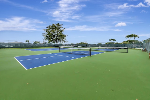 5073 Lakefront Blvd Unit D, Delray Beach, FL 33484 - view of tennis court featuring community basketball court