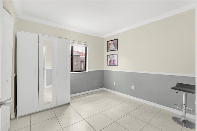 18103 SW 143rd Pl, Miami, FL 33177 - spare room with crown molding and tile patterned floors