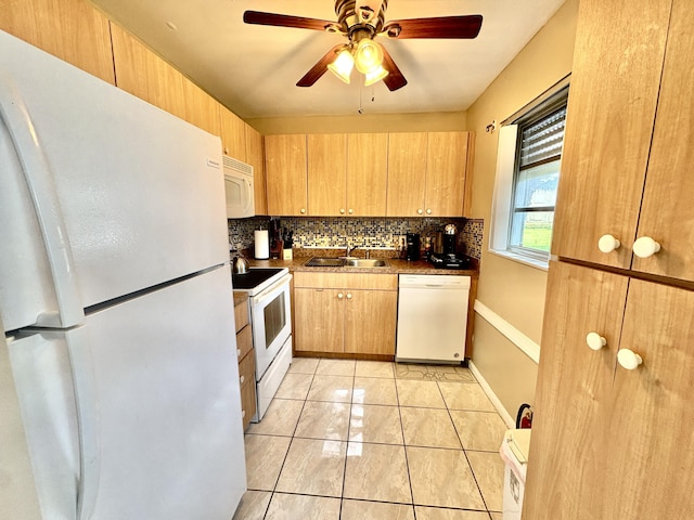64 Canterbury C, West Palm Beach, FL 33417 - kitchen with white appliances, decorative backsplash, ceiling fan, and dark countertops