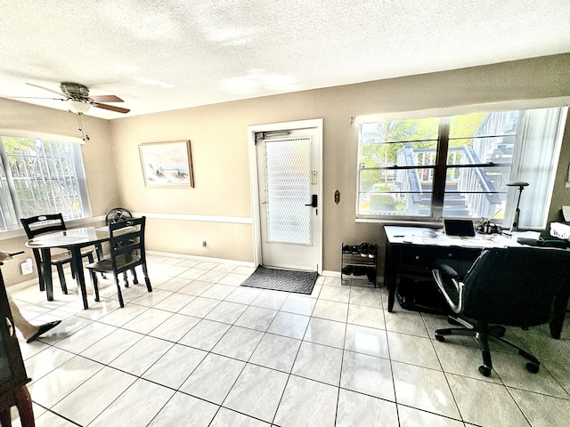 64 Canterbury C, West Palm Beach, FL 33417 - dining space with a textured ceiling, an office area, and light tile patterned flooring