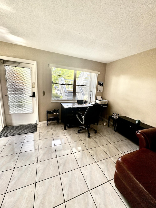 64 Canterbury C, West Palm Beach, FL 33417 - office with light tile patterned flooring and a textured ceiling
