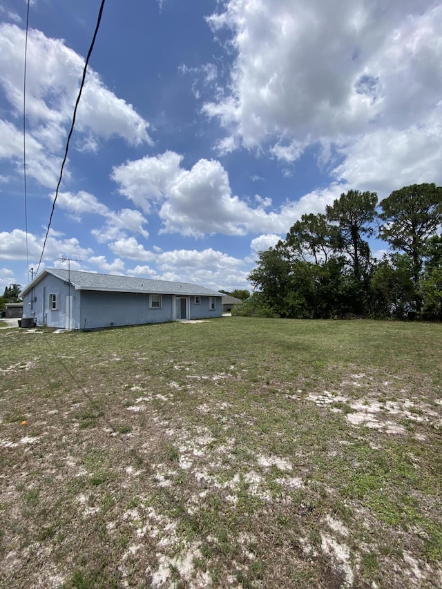 649 SW Heather St, Port Saint Lucie, FL 34983 - view of grassy yard