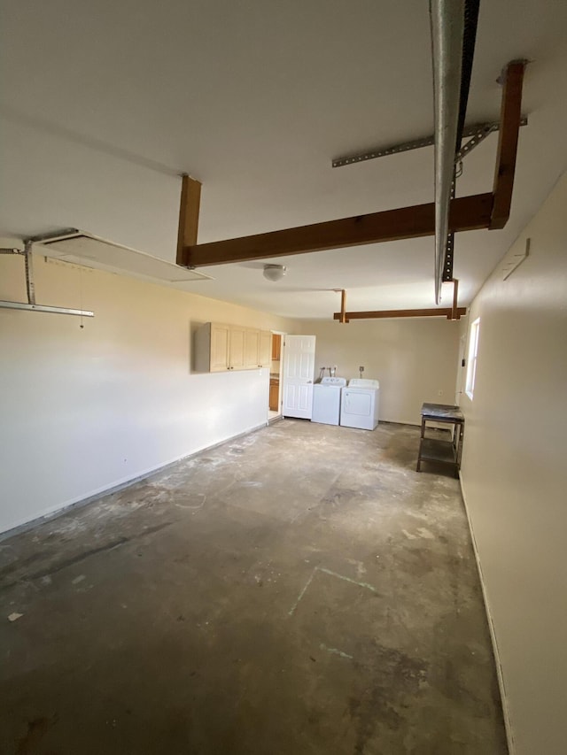 649 SW Heather St, Port Saint Lucie, FL 34983 - garage with washing machine and clothes dryer
