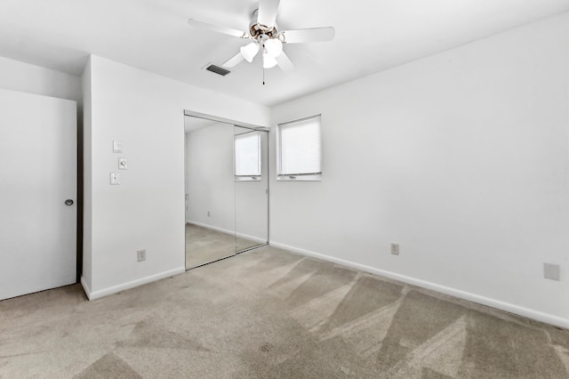 436 Santa Anna Dr, Palm Springs, FL 33461 - unfurnished bedroom with carpet flooring, a closet, and a ceiling fan