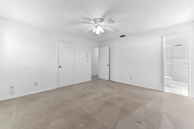 436 Santa Anna Dr, Palm Springs, FL 33461 - unfurnished bedroom with carpet flooring, ensuite bathroom, and a ceiling fan