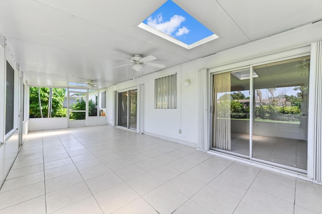 436 Santa Anna Dr, Palm Springs, FL 33461 - unfurnished sunroom featuring ceiling fan and a skylight