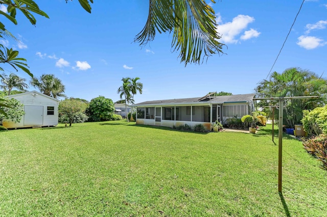 436 Santa Anna Dr, Palm Springs, FL 33461 - view of grassy yard featuring a storage unit