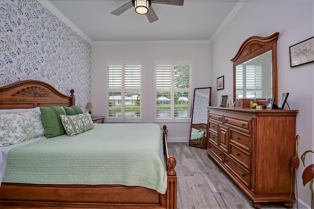 424 NE Leaping Frog Way, Port Saint Lucie, FL 34983 - bedroom featuring light wood-style floors, wallpapered walls, ornamental molding, baseboards, and ceiling fan