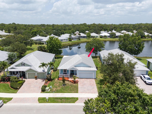 424 NE Leaping Frog Way, Port Saint Lucie, FL 34983 - aerial perspective of suburban area with a nearby body of water