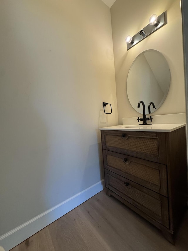 2799 Saranac Ave, West Palm Beach, FL 33409 - bathroom featuring wood finished floors and vanity