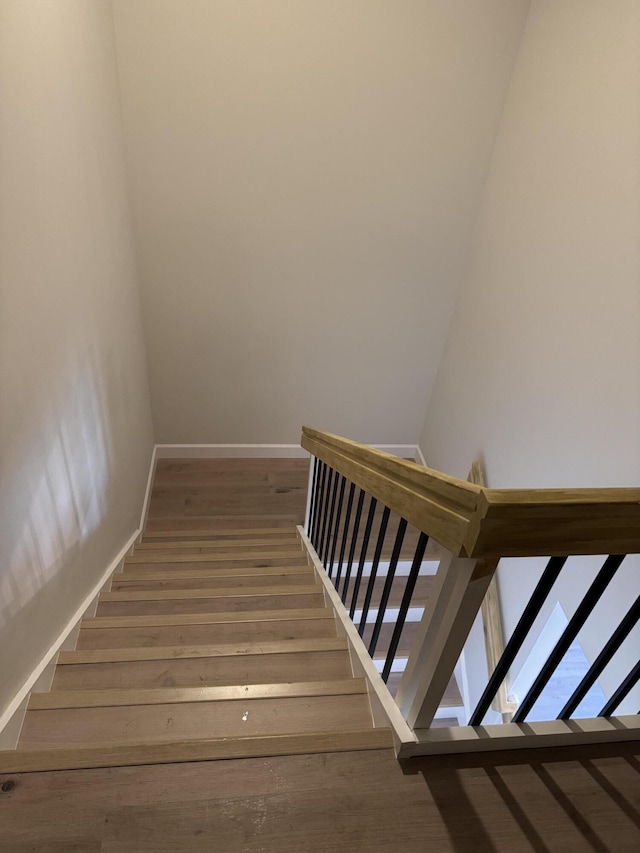 2799 Saranac Ave, West Palm Beach, FL 33409 - stairs featuring wood finished floors and baseboards