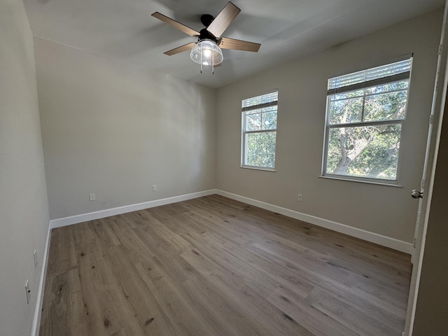 2799 Saranac Ave, West Palm Beach, FL 33409 - empty room featuring wood finished floors and a ceiling fan