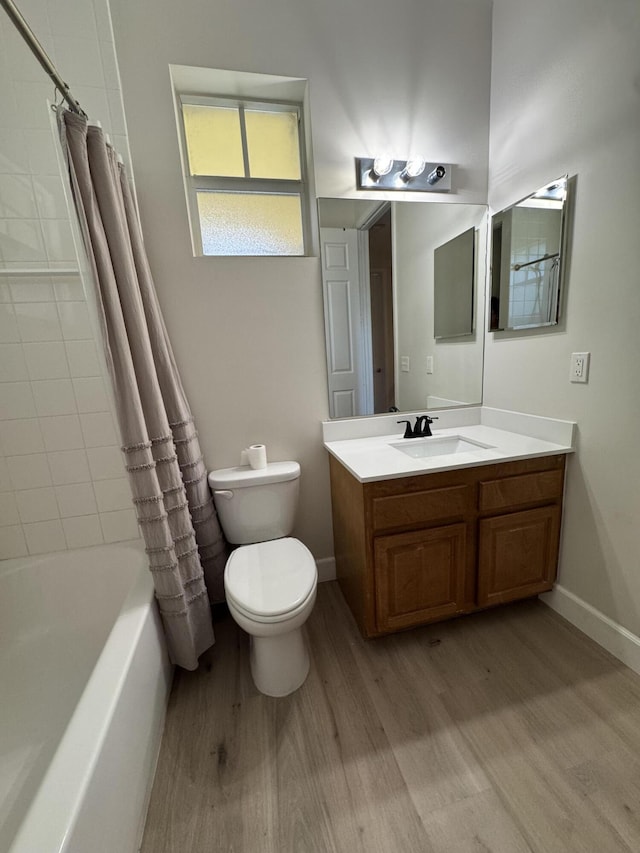 2799 Saranac Ave, West Palm Beach, FL 33409 - full bathroom with wood finished floors, vanity, and shower / bathtub combination with curtain
