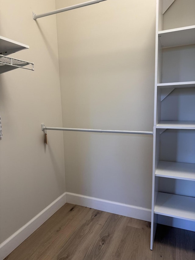 2799 Saranac Ave, West Palm Beach, FL 33409 - walk in closet with wood finished floors