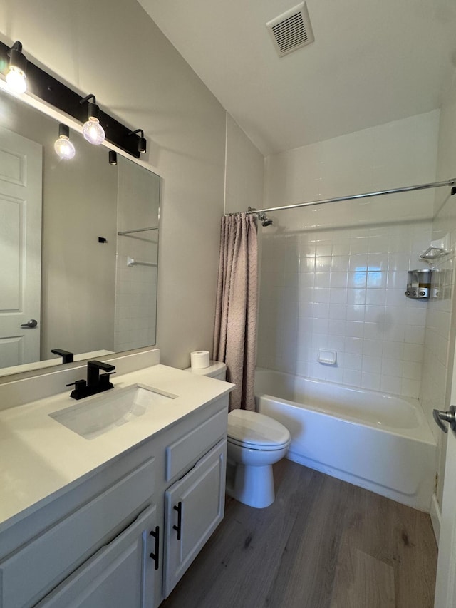 2799 Saranac Ave, West Palm Beach, FL 33409 - bathroom featuring wood finished floors, shower / tub combo, and vanity