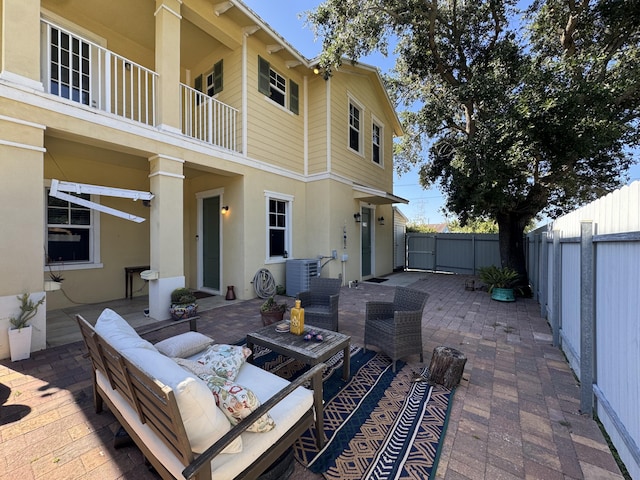 2799 Saranac Ave, West Palm Beach, FL 33409 - patio / terrace with a patio, a fenced backyard, and an outdoor living space