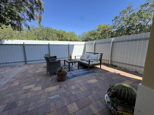 2799 Saranac Ave, West Palm Beach, FL 33409 - fenced backyard with outdoor lounge area and a patio