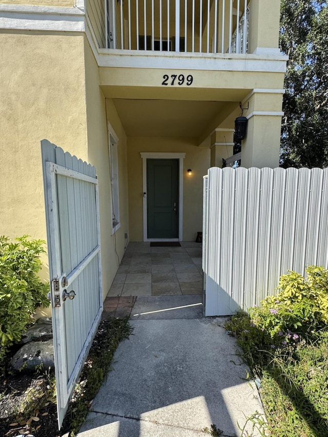2799 Saranac Ave, West Palm Beach, FL 33409 - view of exterior entry with stucco siding