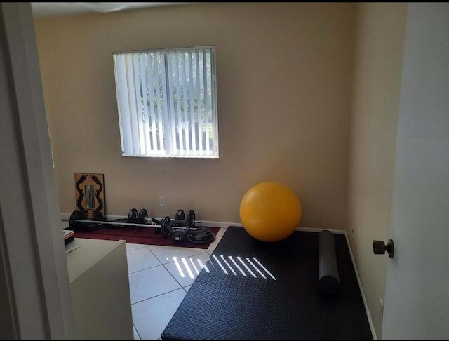 3531 Tall Pine Way Unit B-2, Greenacres, FL 33463 - exercise room featuring baseboards and tile patterned flooring
