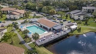 3531 Tall Pine Way Unit B-2, Greenacres, FL 33463 - view of property location featuring a nearby body of water and a pool area