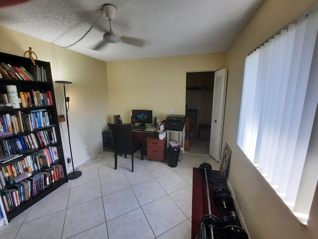 3531 Tall Pine Way Unit B-2, Greenacres, FL 33463 - office area featuring ceiling fan, a textured ceiling, and light tile patterned flooring
