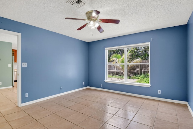 3 Ripley Way, Boynton Beach, FL 33426 - unfurnished room with a textured ceiling, tile patterned floors, and ceiling fan