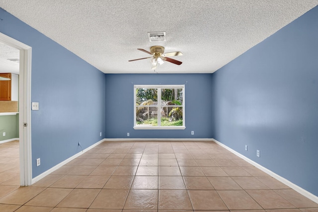 3 Ripley Way, Boynton Beach, FL 33426 - empty room with a ceiling fan, a textured ceiling, and tile patterned floors