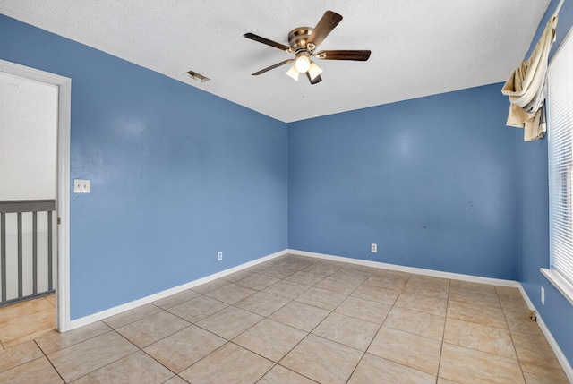3 Ripley Way, Boynton Beach, FL 33426 - tiled empty room with ceiling fan and a textured ceiling