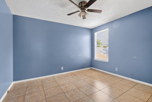 3 Ripley Way, Boynton Beach, FL 33426 - empty room featuring a textured ceiling, a ceiling fan, and tile patterned flooring
