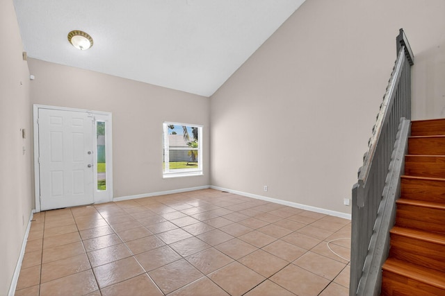 3 Ripley Way, Boynton Beach, FL 33426 - foyer with light tile patterned floors, high vaulted ceiling, and stairway