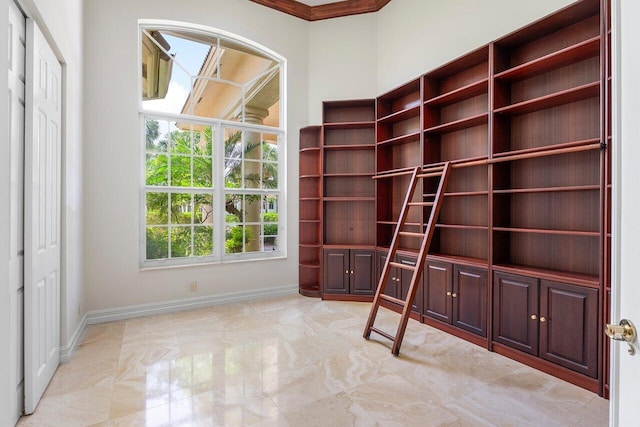 16164 Bridlewood Cir, Delray Beach, FL 33445 - unfurnished room featuring baseboards, crown molding, and light marble finish flooring
